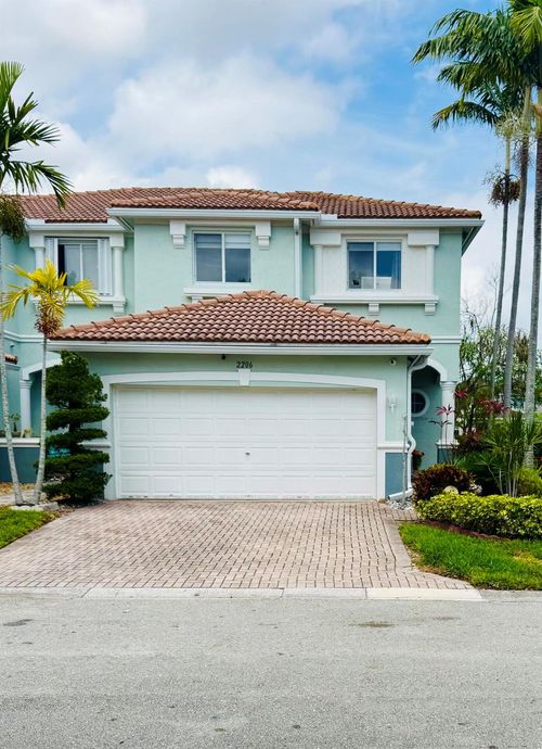 2206 Oakmont Dr, Riviera Beach, FL, 33404-1834 | Card Image