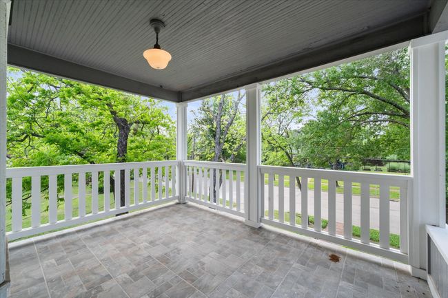 View of patio / terrace with view of wooded area | Image 5