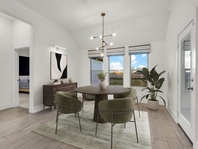 Virtually Staged: Dining Area that overlooks the backyard. | Image 14