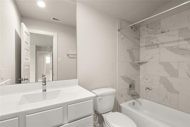 This photo is for illustrative purposes only and is not to be considered an exact replica of the finished home. Rendering does not match the finished product in terms of features, colors, landscaping, etc. Pricing, specifications, square footage and materials are subject to change at any time and without notice. | Image 14