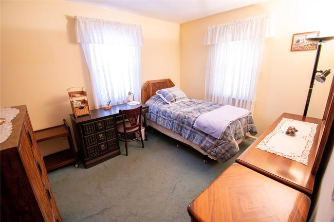 View of carpeted bedroom | Image 11