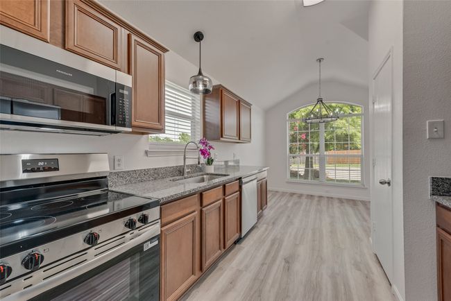New stainless appliances, granite countertops, new sink and faucet | Image 10