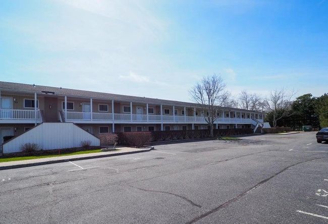 View of property with uncovered parking | Image 27