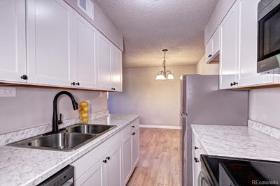 104 - 50 E Highline Circle, Condo with 2 bedrooms, 1 bathrooms and 1 parking in Centennial CO | Image 2