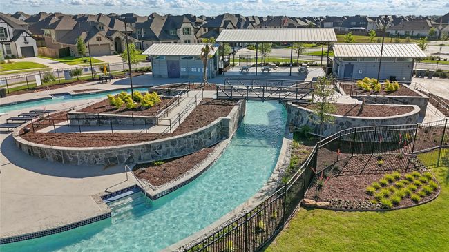 Community pool with a residential view | Image 39