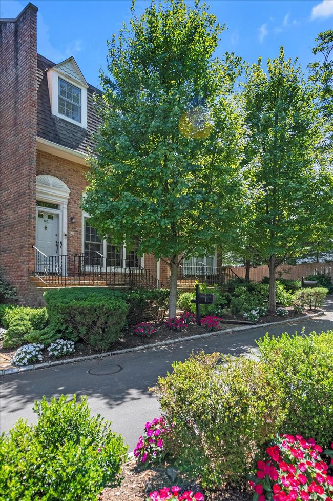 View of front of home with brick siding and roof with shingles | Image 18