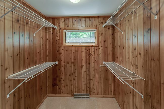 Primary walk-in closet. | Image 23