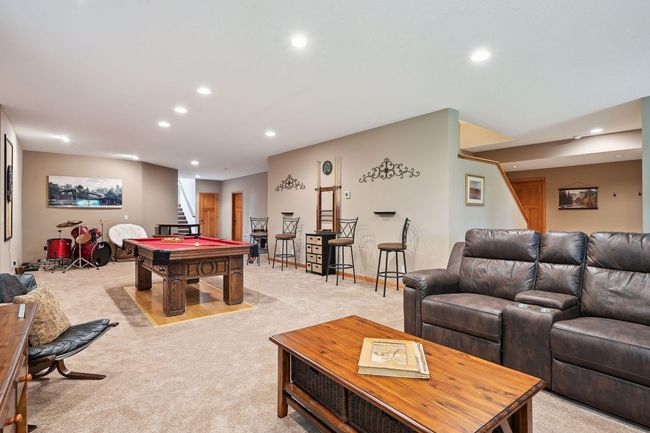 The lower level features a very large entertaining space. | Image 20