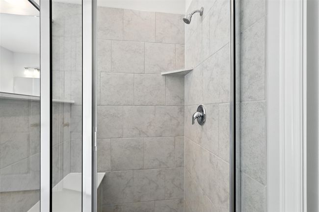 Bathroom featuring a shower stall | Image 19