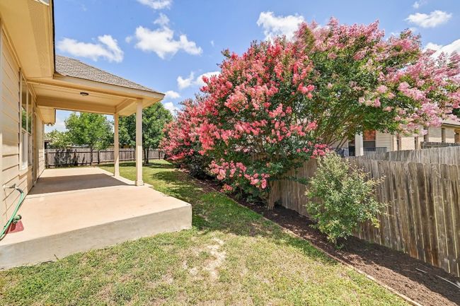 Fenced backyard featuring a patio | Image 23