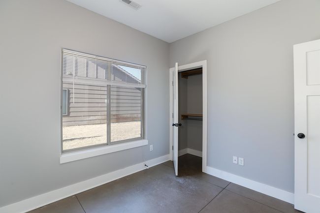 View of unfurnished bedroom | Image 13