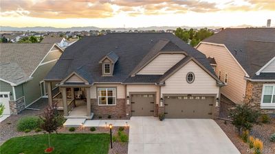 Welcome to one of the largest floorplans in Heritage Todd Creek offering over 6400 total square feet! | Image 1