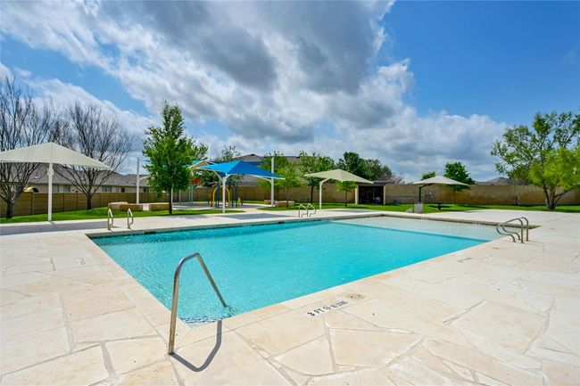 Community pool featuring a patio | Image 21