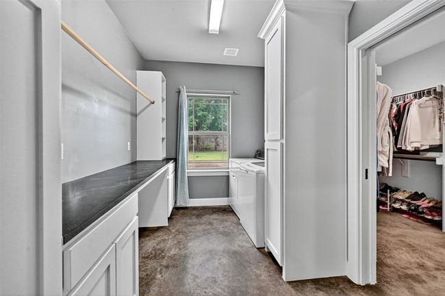 Laundry room with access from primary closet and off mudroom | Image 29