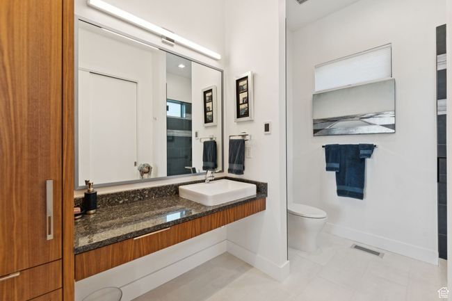 Bathroom featuring vanity and tile patterned flooring | Image 35