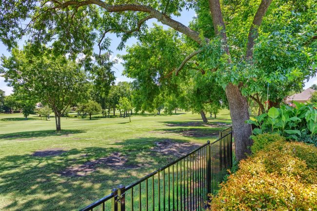 Looking over the fence to the golf course | Image 34