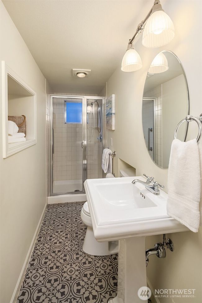 Refreshed & cute lower level 3/4 bath. | Image 30