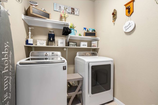 Laundry room with separate washer and dryer | Image 19