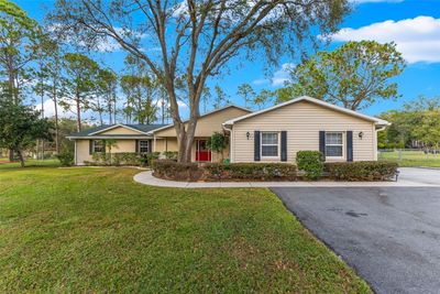 32576 Greenwood Loop, House other with 4 bedrooms, 3 bathrooms and null parking in Wesley Chapel FL | Image 2