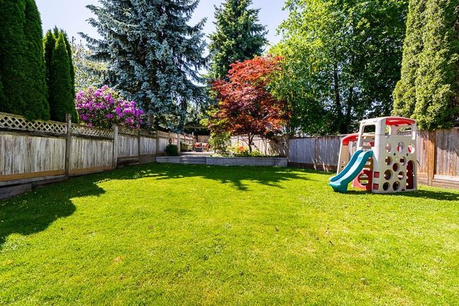 View of yard featuring a playground | Image 34