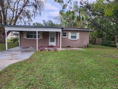 Front Elevation with carport at 3203 Decatur Ave Lakeland Fl | Image 1