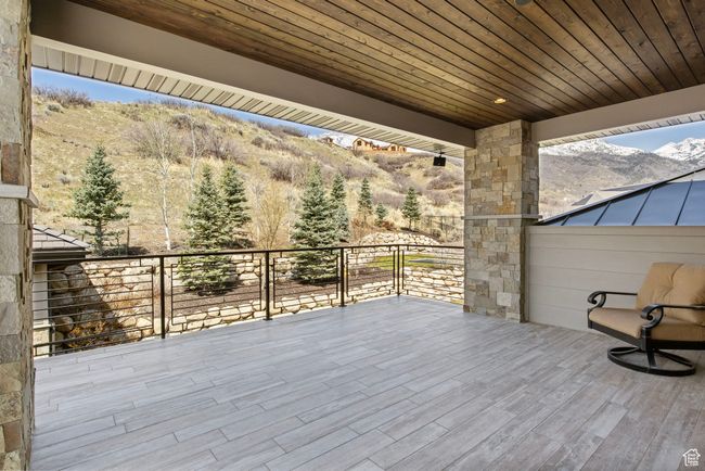 View of patio with a balcony and a mountain view | Image 117