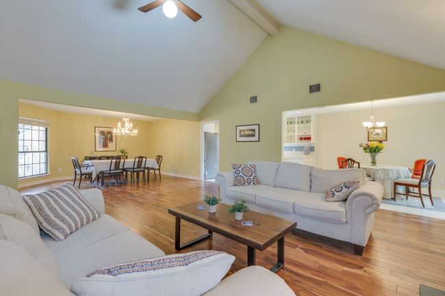 Living area open to both dining areas | Image 4