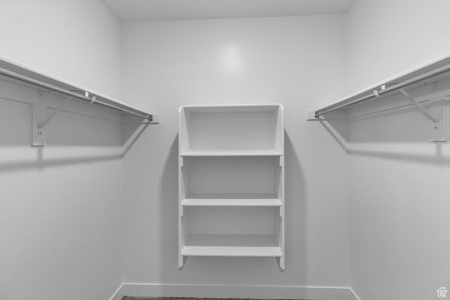 View of spacious closet | Image 13