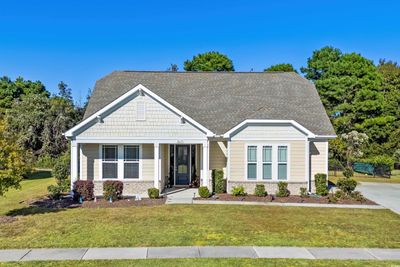 View of front of property featuring a front yard | Image 1