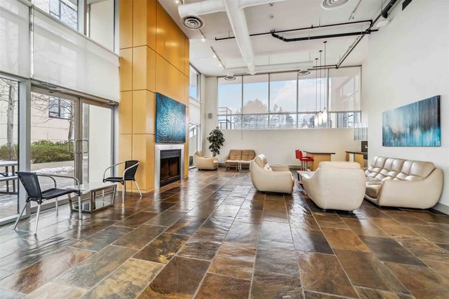 Community lobby with a towering ceiling | Image 26