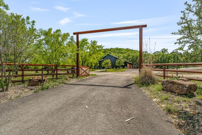 View of street with aphalt driveway | Image 16