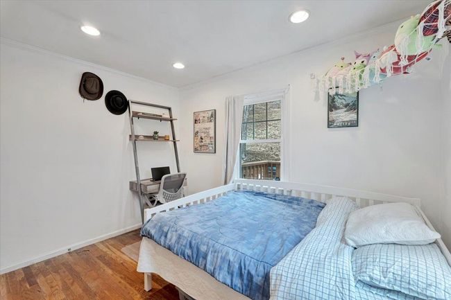 Bedroom featuring recessed lighting, crown molding, baseboards, and wood finished floors | Image 16