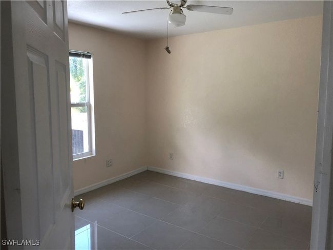 5615 Birdsong Ln, Home with 4 bedrooms, 2 bathrooms and null parking in BOKEELIA FL | Image 15