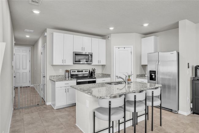 Kitchen with corner walkin pantry | Image 4