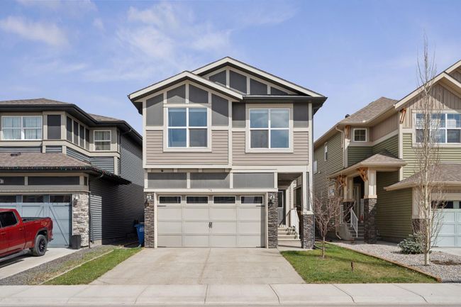 74 Buckskin Way, Home with 4 bedrooms, 3 bathrooms and 4 parking in Cochrane AB | Image 1