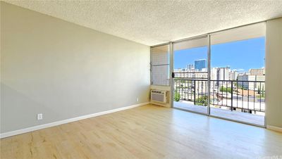 Living room with city and mountain views | Image 2