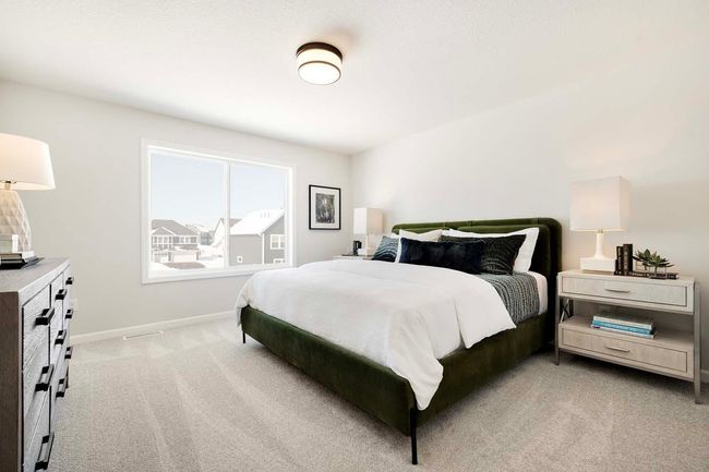 Large window in primary bedroom. | Image 11