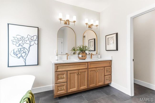 Primary en suite with dual sinks and private toilet room! | Image 36