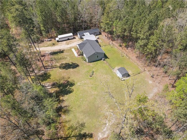 Drone / aerial view featuring a wooded view | Image 44