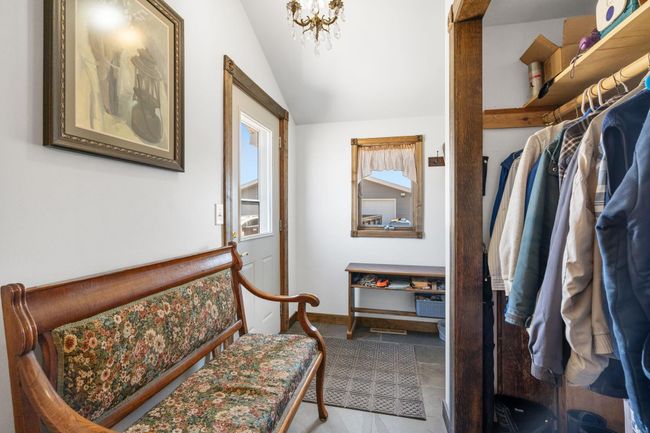 Mudroom entry has beautiful slate flooring | Image 22