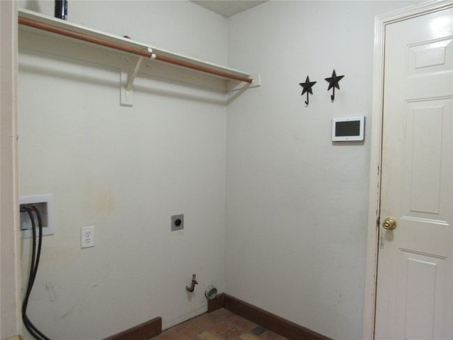 Clothes washing area with washer hookup, hookup for a gas dryer, baseboards, and laundry area | Image 8