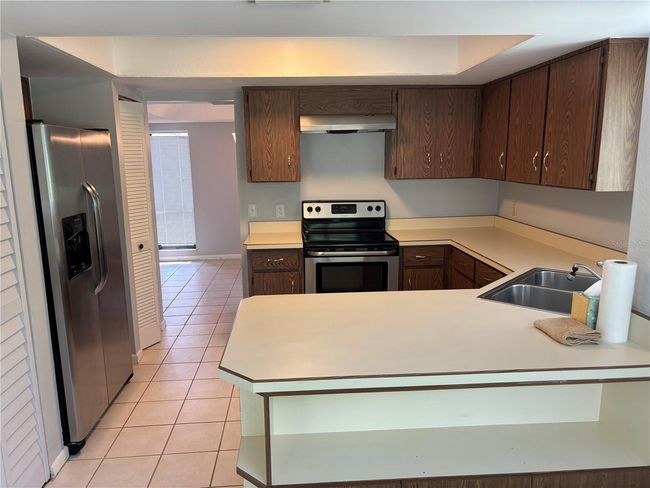 View from eat in kitchen area through to the dining room | Image 12