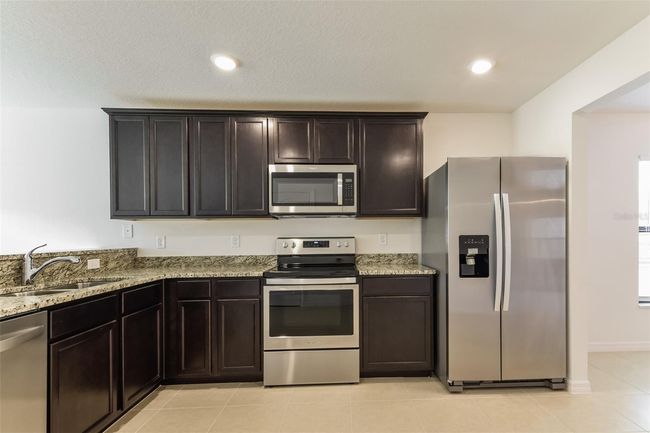 8530 Silverbell Loop, House other with 3 bedrooms, 2 bathrooms and null parking in BROOKSVILLE FL | Image 5