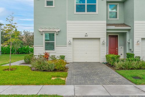 211 Se Woodbark St, Port St Lucie, FL, 34984-6695 | Card Image