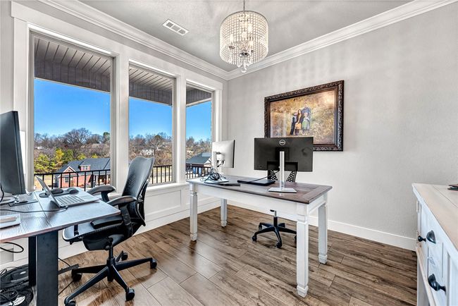 Lots of natural light out those gorgeous windows of the formal dining/office. | Image 11