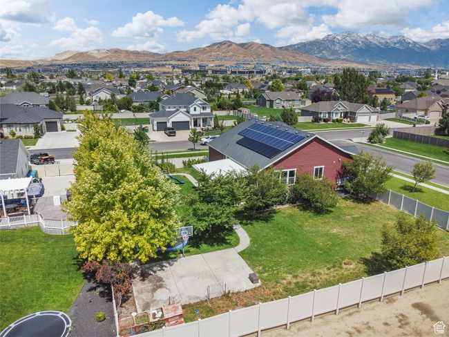 Aerial perspective of suburban area featuring a mountain backdrop | Image 42