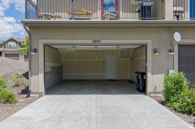 Garage featuring driveway | Image 39