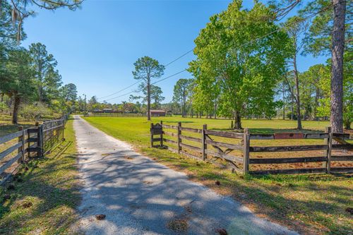 100 Wild Horse Run, Deltona, FL, 32738-9392 | Card Image