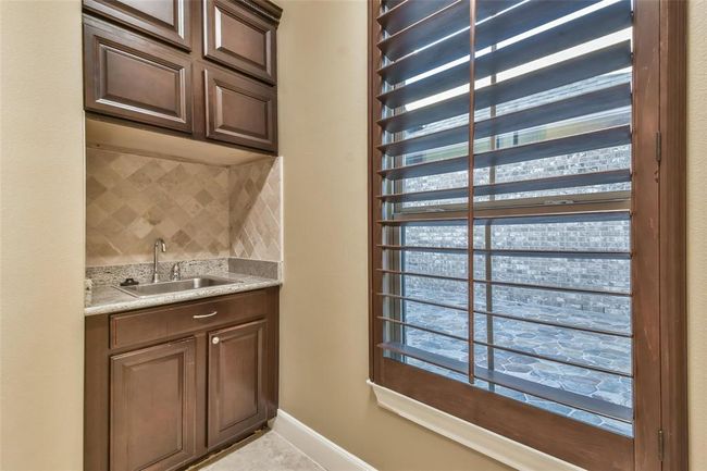 Utility Room/Laundry Room with custom built in sink | Image 34