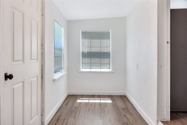 Empty room with wood finished floors | Image 26